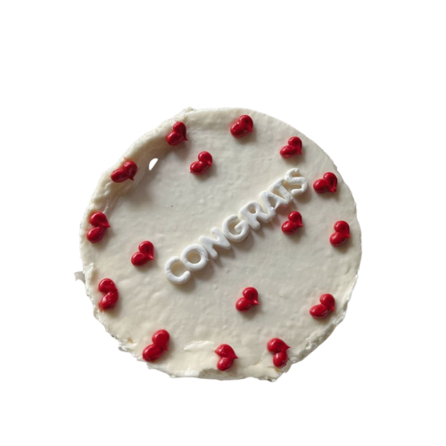 2 pounds white congratulations cake decorated with red hearts and “Congrats” message