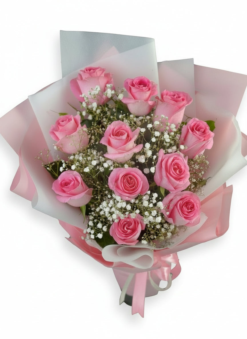pick bouquet with pink flowers by Flower Room including baby breaths