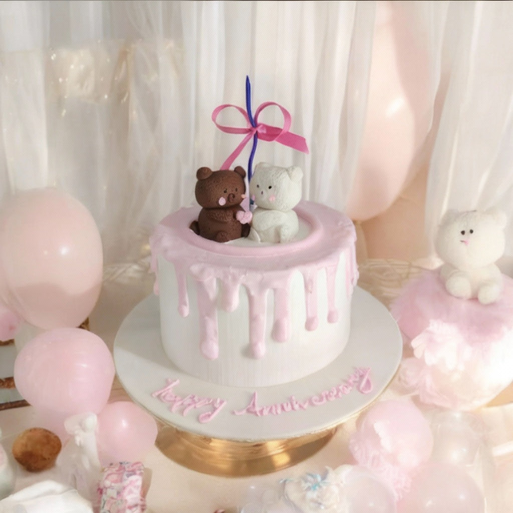 Pink and white anniversary cake with plush bear and bunny figurines, dripping frosting effect, and ribbon bow - a whimsical and heartfelt celebration.