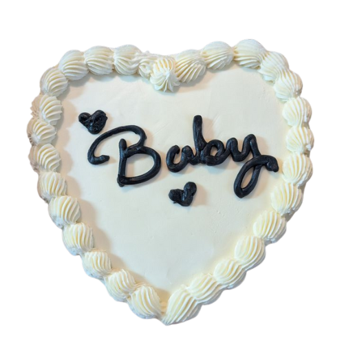 "Baby Heart Cake shaped as a heart with creamy white frosting for baby shower celebrations, available in Lahore, Karachi, and Islamabad"