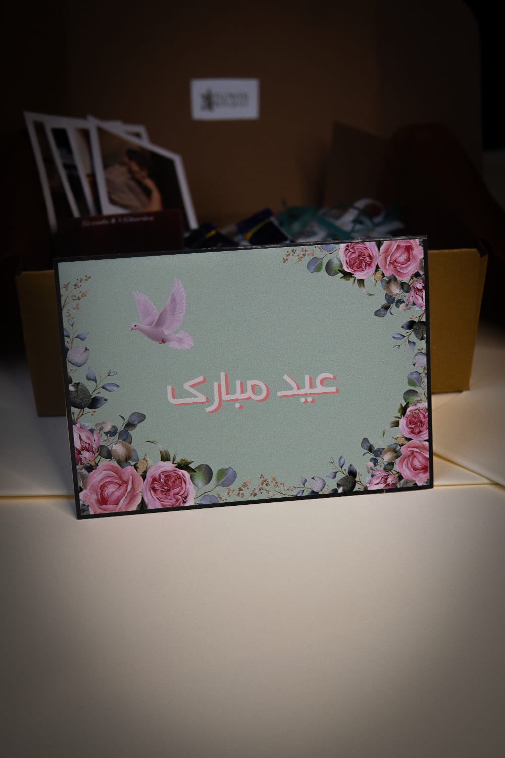 Beautiful Eid Mubarak card with floral border and white dove
