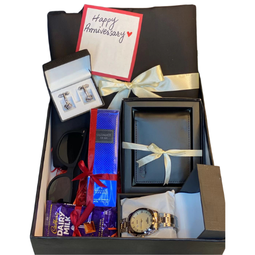 Classic men’s gift box with shalwar kameez, chain watch, perfume, cufflinks, wallet, sunglasses, chocolate, and handwritten card