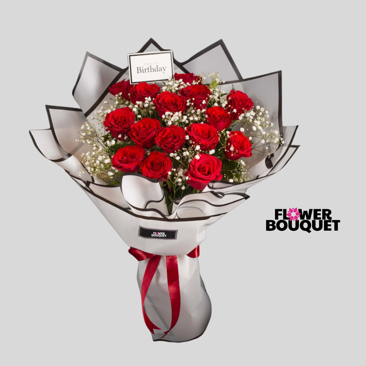 red roses flower boquet with unique white wrapping 