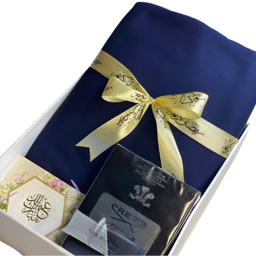 Elegant Eid gift box with unstitched cotton suit, chain watch, and greeting card