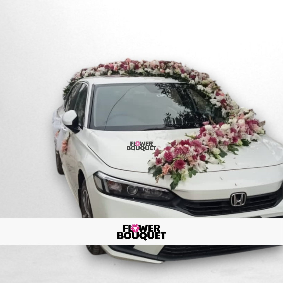 White Honda car decorated with pink and white flowers.