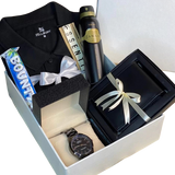 Elegant men’s gift set with polo shirt, chain watch, leather wallet, body spray, and chocolate