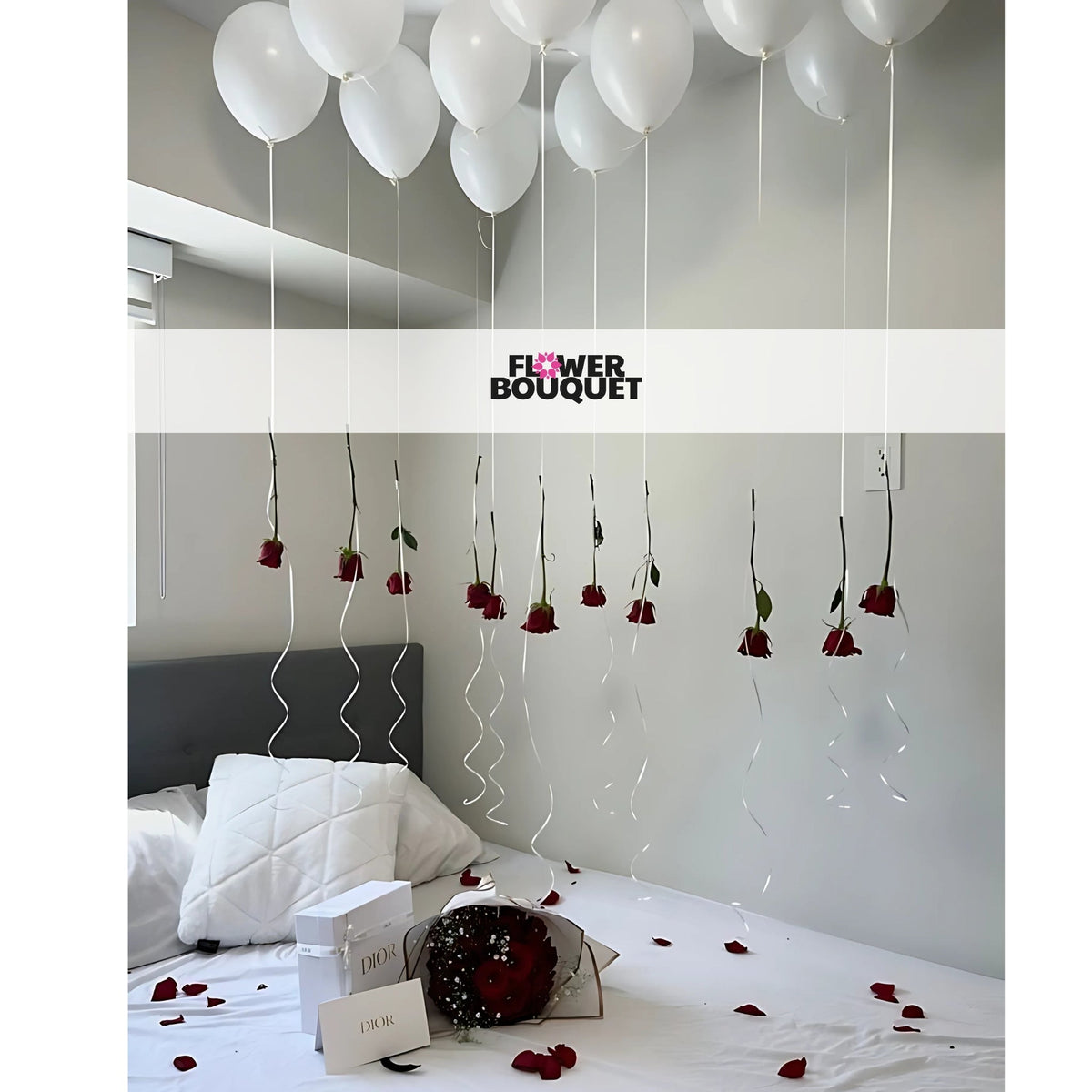 Enchanted Balloon and Rose Bedroom Decor with white balloons, red roses, white bedding, rose petals, and Dior gift boxes.