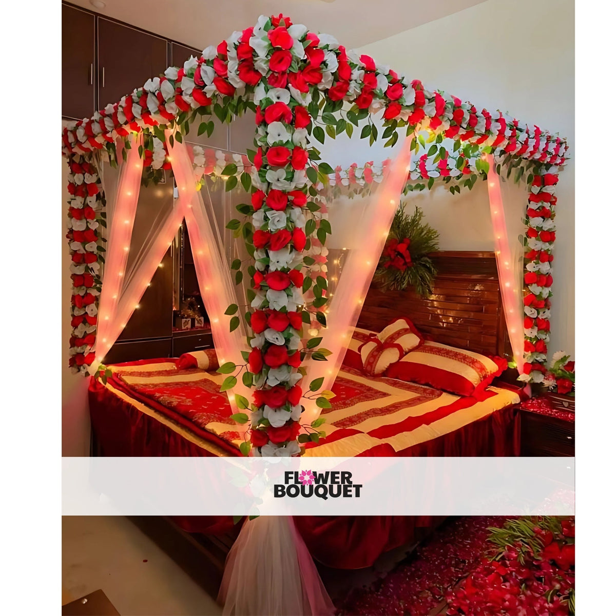 Enchanted Floral Canopy Bed Decor with red and white flowers, green foliage, string lights, and white fabric drapery.