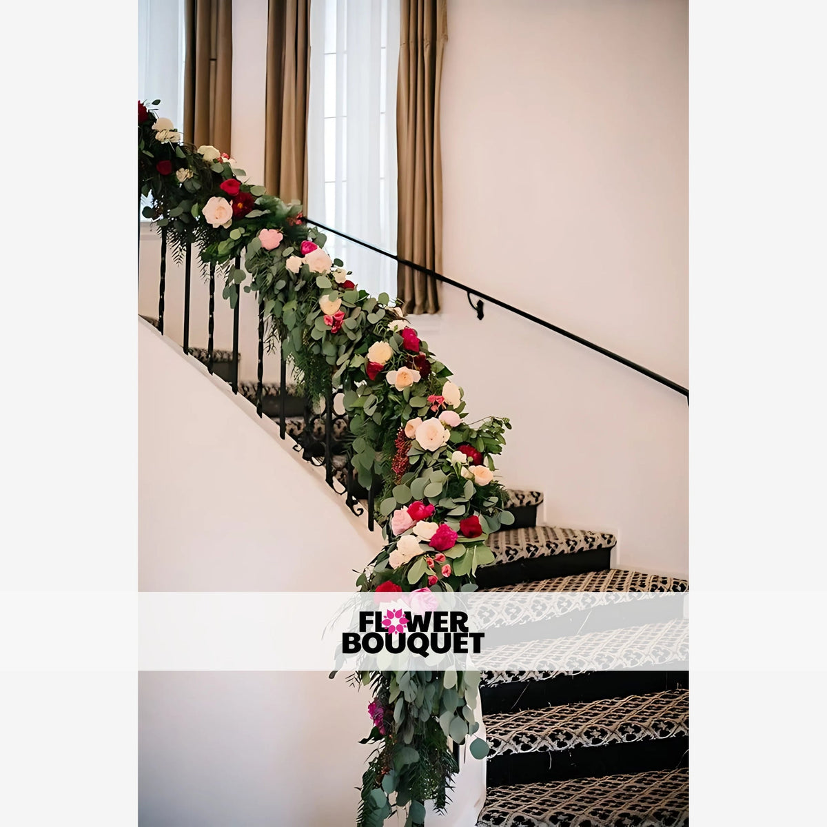 Elegant floral garland with green foliage and vibrant pink, white, and red flowers draping along a staircase railing, perfect for weddings and event décor.