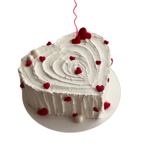Eternal Love Cake with white cream frosting and red heart decorations