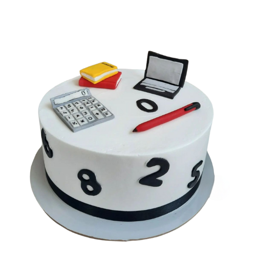 "Farewell theme cake decorated with edible laptop, calculator, books, and pen on a white fondant base."