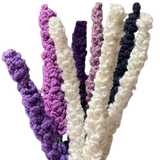 Handmade crochet lavender bouquet with purple, white, and violet stems, crafted with yarn.