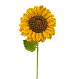 Handmade crochet sunflower with yellow petals, brown center, and green leaf on a stem.