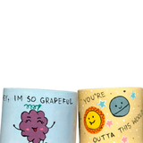 Set of two 5-inch cylindrical Painted Planters with Haworthia succulents, featuring green leaves with white spots, in yellow and blue pots with hand-painted designs of a sun, planet, and grapes, with messages “You’re Outta This World” and “Hey, I’m So Grapeful For You.”