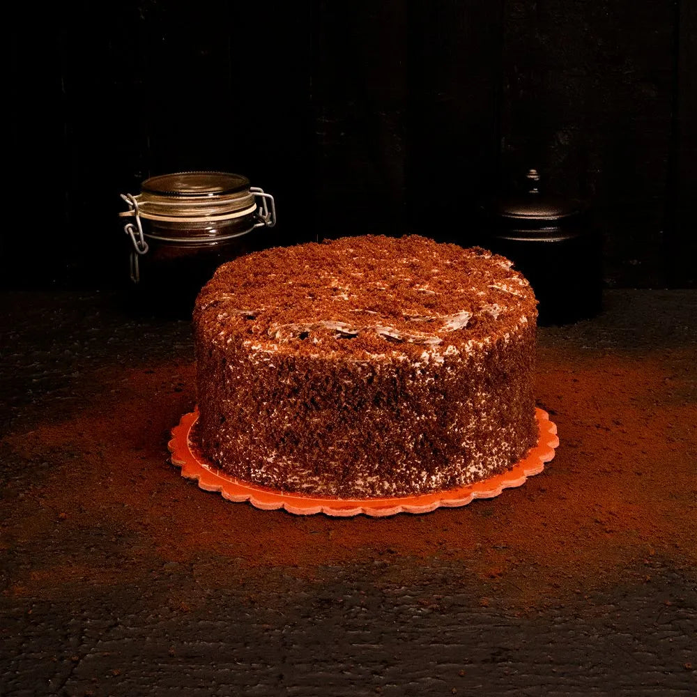 "Jlal Sons Classic Hazelnut Cake with chocolate sponge and hazelnut coating, available in Lahore, Karachi, and Islamabad"