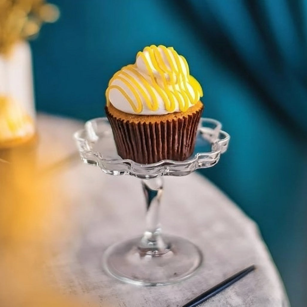 A beautifully crafted Keylime Cupcake with lime-infused frosting, tangy glaze, and vibrant citrus zest, perfect for a tropical dessert treat.