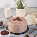 "Kitchen Cuisine Cadbury Chocolate Cake with Cadbury chocolate cream and topping, available in Lahore, Karachi, and Islamabad"