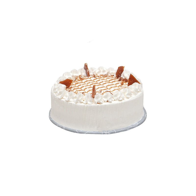 "Kitchen Cuisine Caramel Crunch Cake with caramel cream, drizzle, and nut topping, available in Lahore, Karachi, and Islamabad"