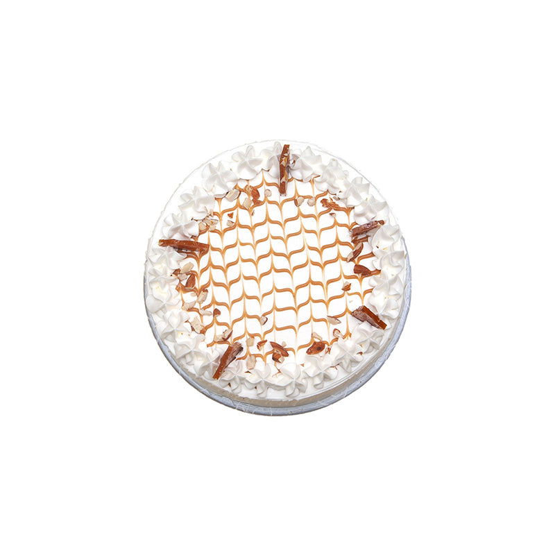 "Kitchen Cuisine Caramel Crunch Cake with caramel cream, drizzle, and nut topping, available in Lahore, Karachi, and Islamabad"