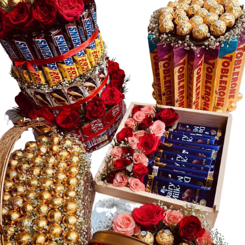 Large luxury chocolate hamper with Toblerone, Dairy Milk, Ferrero Rocher, Snickers, and red roses – perfect gift for special occasions