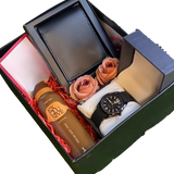 Luxury men’s gift box with leather wallet, wristwatch, J. body spray, roses, and handwritten card