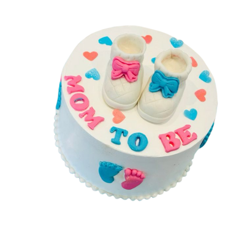 "Mom ToBe Cake with fondant baby shoes and pastel blue and pink design for baby shower celebrations in Lahore, Karachi, and Islamabad"