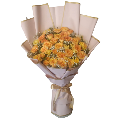 Peach rose bouquet with baby’s breath in white and gold wrapping – same-day flower delivery in Pakistan.