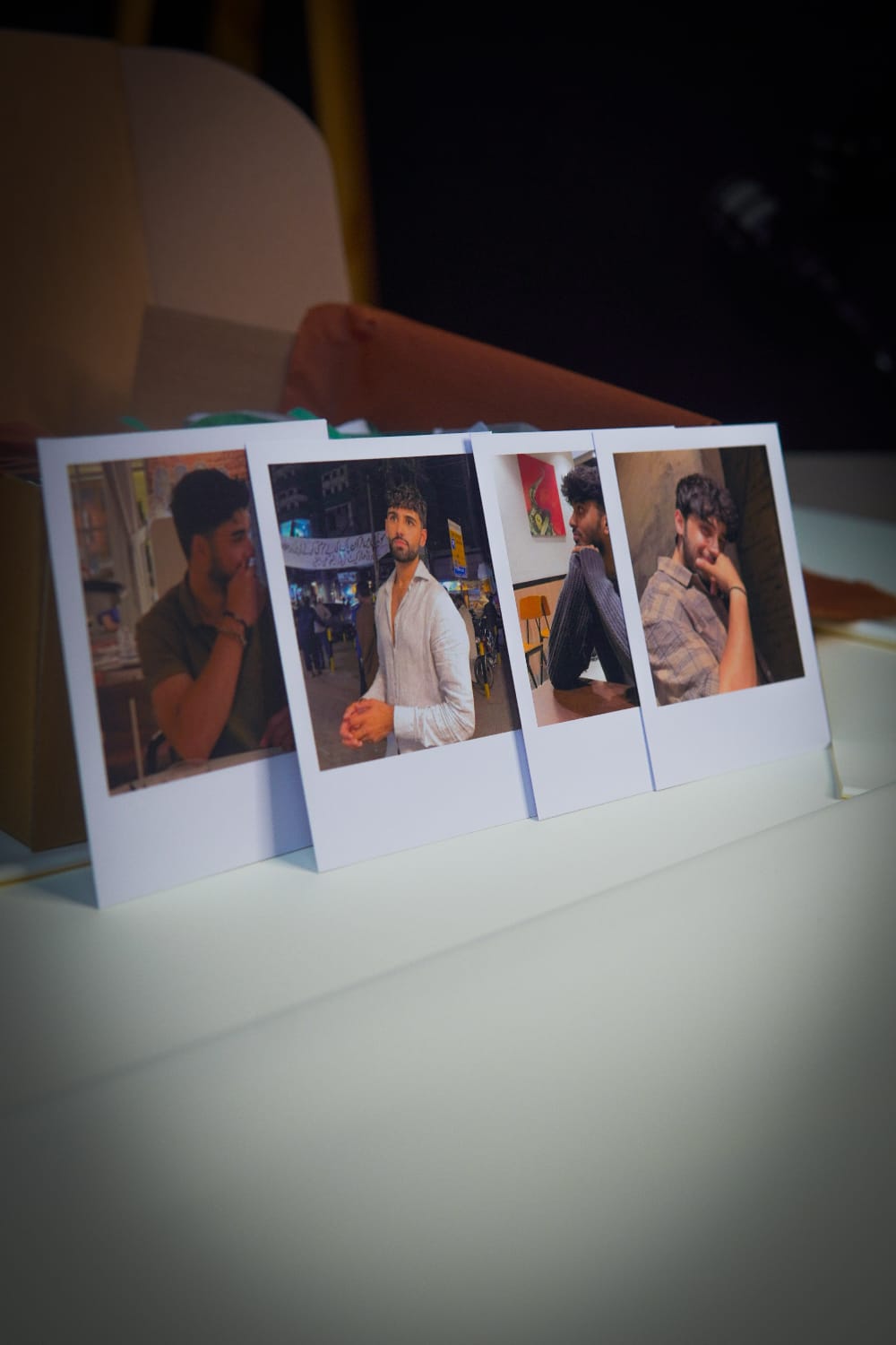 Printed polaroid-style photos included in custom Eid gift box for boys"