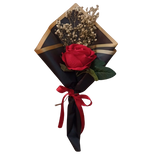 Solo Bloom bouquet with a single red rose and baby’s breath wrapped in black luxury paper with gold trim and red satin ribbon — same-day delivery in Pakistan.