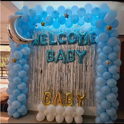 Welcome baby shower decoration with blue balloons, silver backdrop, and arch design in Pakistan