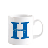 White ceramic alphabetic mug with blue letter design – stylish personalized coffee mug for gifting