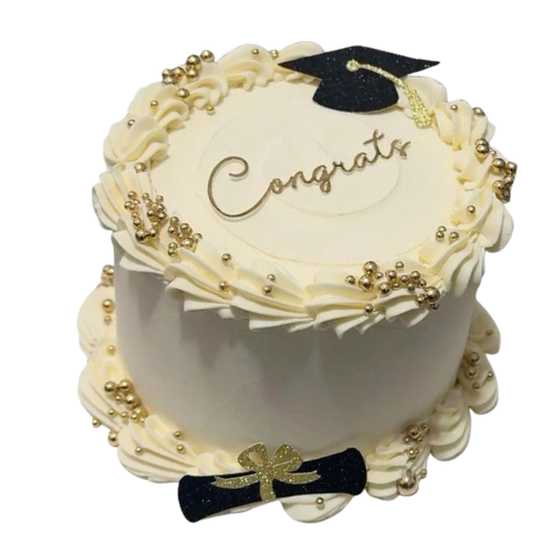 White graduation congratulations cake with golden pearls, graduation cap, and diploma design