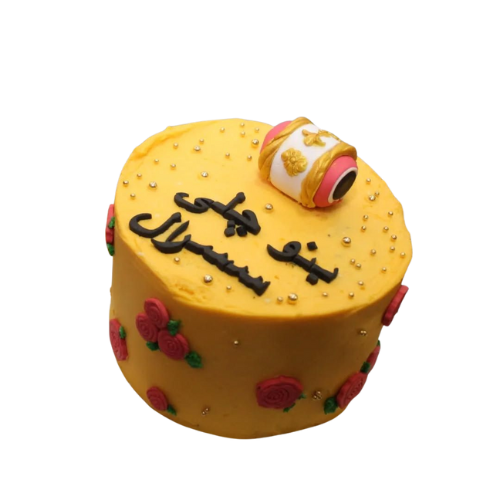 Yellow mehndi wedding cake with red roses, golden pearls, and dholki decoration